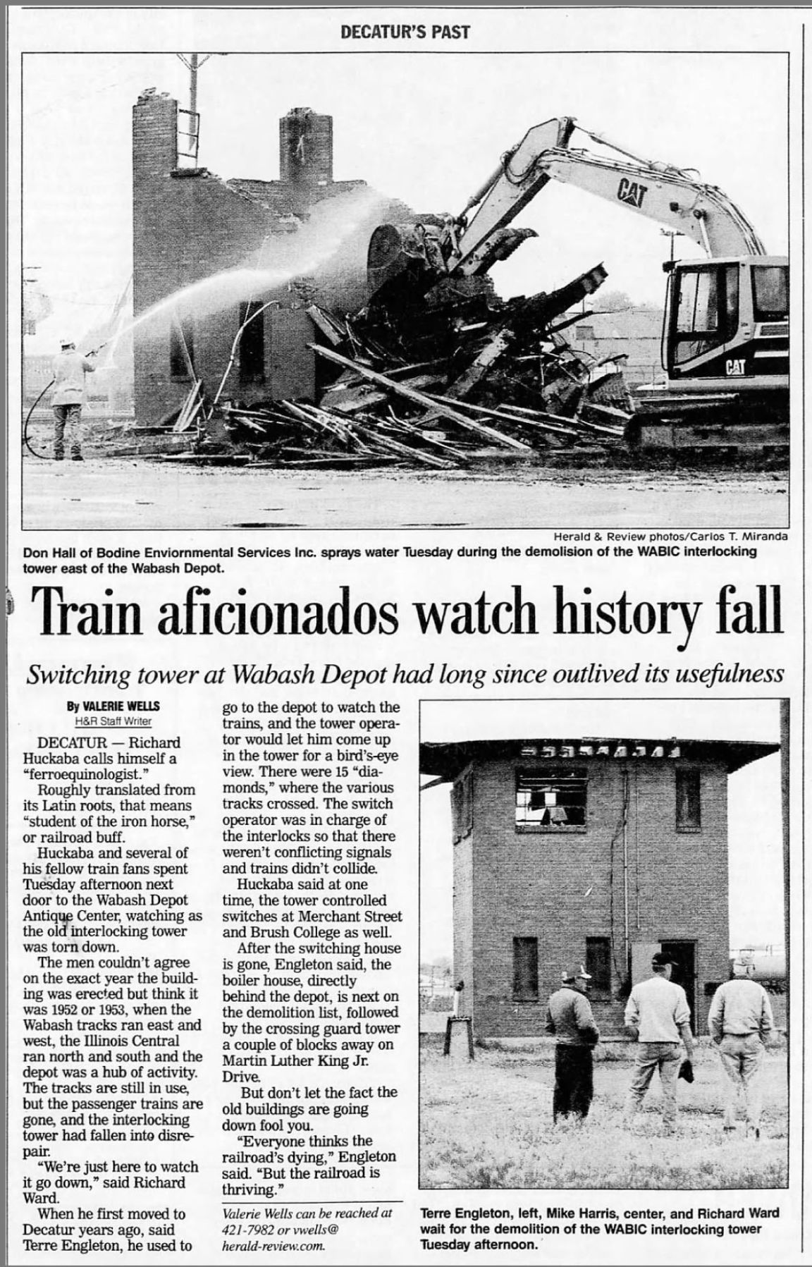 Train aficionados watch history fall